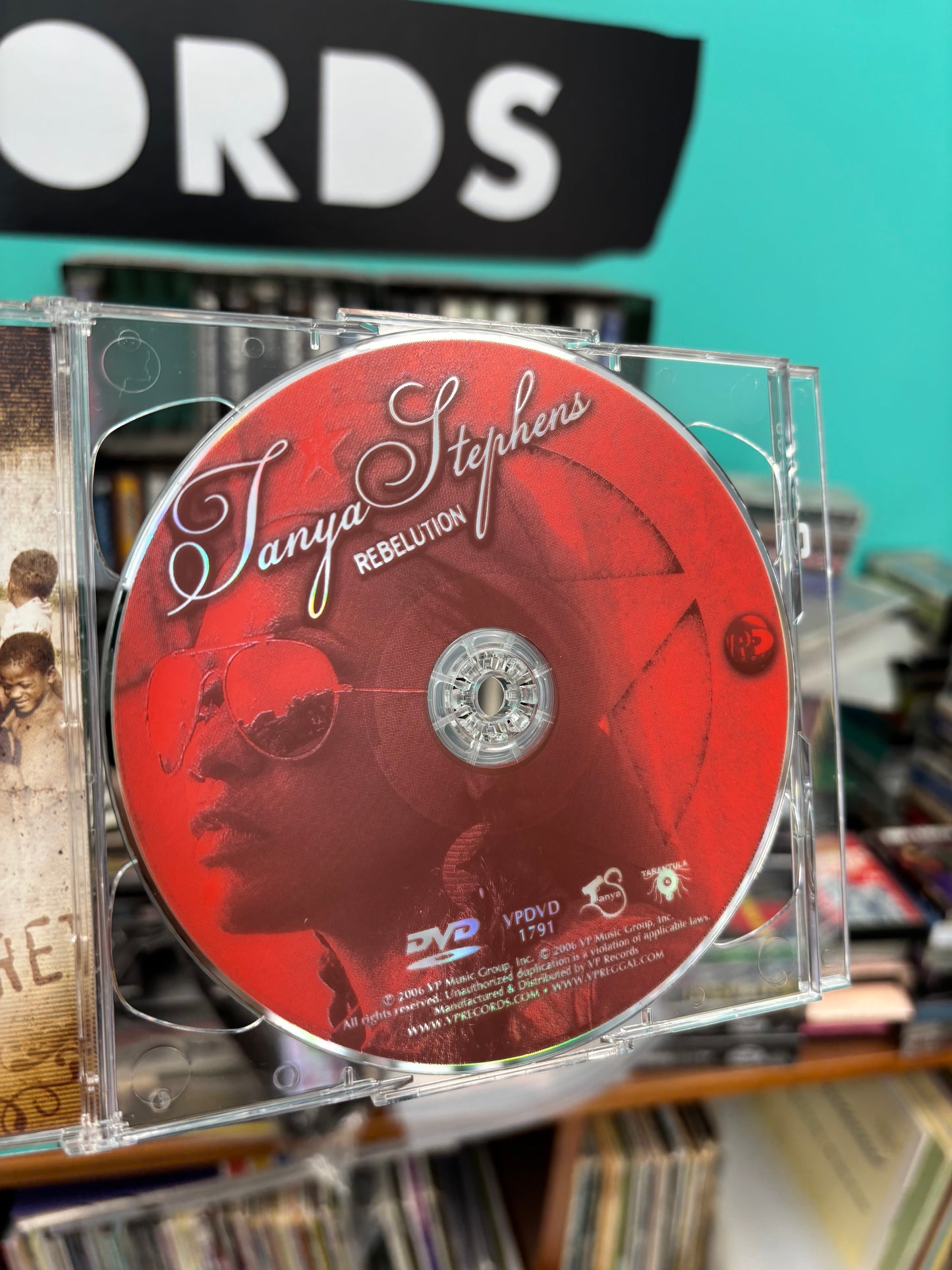 Tanya Stephens: Rebelution, CD + DVD, VP Records, Tarantula Records, US 2006