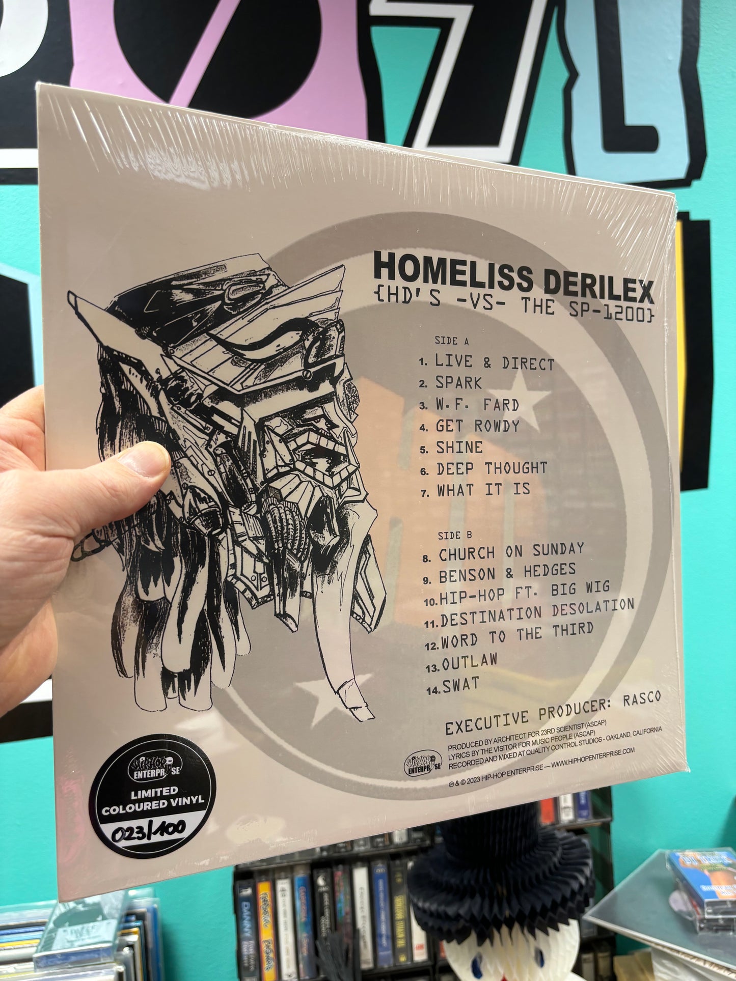 HULLU VARASTOALE -20%‼️‼️‼️Homeliss Derilex: {HD’s -Vs- The SP-1200}, LP, blue vinyl, Belgium 2023