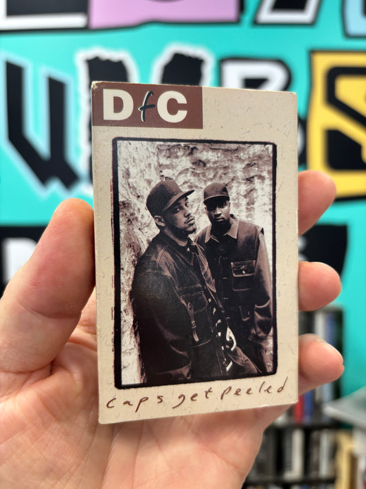 DFC: Caps Get Peeled, Cassette single, 1st pressing, Only cassette pressing, Big Beat, US 1994